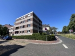 Hausansicht - Wohnen AM HAARENUFER! Bezugsfreie 2,5-Zimmer-Wohnung im Hochparterre.