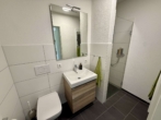 Badezimmer - Moderne 3-Zimmer-Wohnung mit großem Süd-West-Balkon und TG Stellplatz in Uni-Nähe