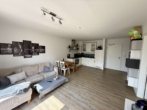 Wohn- und Essbereich - Moderne 3-Zimmer-Wohnung mit großem Süd-West-Balkon und TG Stellplatz in Uni-Nähe