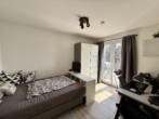 Schlafzimmer - Moderne 3-Zimmer-Wohnung mit großem Süd-West-Balkon und TG Stellplatz in Uni-Nähe