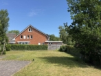 Gemeinschaftsgarten - Ankommen, durchatmen, wohlfühlen – Ihre Ferienwohnung auf Borkum mit Terrasse