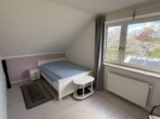 Kinderzimmer - Familienfreundliches Einfamilienhaus mit viel Platz und schönem Garten in ruhiger Lage von Wüsting