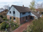 Hausansicht - Familienfreundliches Einfamilienhaus mit viel Platz und schönem Garten in ruhiger Lage von Wüsting