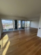 Wohnzimmer - Einmaliger Ausblick! Neubau-Wohnung am Oldenburger Stadthafen im 11. OG!