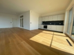 Küchenbereich - Einmaliger Ausblick! Neubau-Wohnung am Oldenburger Stadthafen im 11. OG!