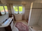 Badezimmer WE 2 - Kapitalanleger aufgepasst! Junges 4-Parteien-Haus in ruhiger Lage.