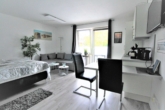 Wohnzimmer - Moderne Ferienwohnung mit Terrasse, Tiefgaragenstellplatz und Schwimmbad in Cuxhaven-Döse