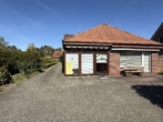 Hausansicht hinten - Einfamilienhaus mit großem Grundstück und viel Potenzial in Achternmeer