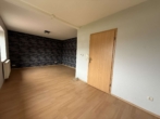 Wohnzimmer - Einfamilienhaus mit Garage, Keller und Garten in Bookholzberg