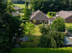 Grundstücksübersicht hinten - Gepflegter Walmdachbungalow mit traumhaftem Garten – ländlich wohnen nahe Bad Zwischenahn