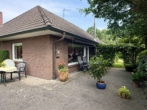 Terrasse - Gepflegter Walmdachbungalow mit traumhaftem Garten – ländlich wohnen nahe Bad Zwischenahn